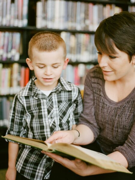Mother & son reading a book