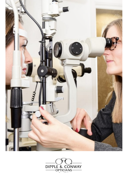 A lady checking someones eyes